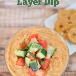 This recipe for layered Mediterranean dip is one you'll make over and over again! by Uncommon Designs