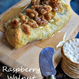 The perfect Holiday Appetizer! Raspberry Walnut Baked Brie via Uncommon Designs