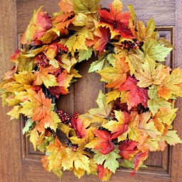 Make a fall leaf wreath in just minutes! Grab a few garlands and a grapevine wreath and you can create this beauty with Uncommon Designs