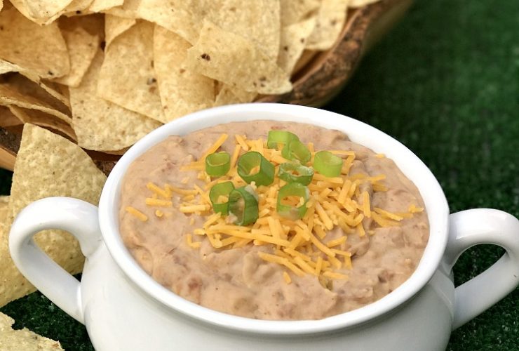 It is football time and my favorite season for this recipe for Spicy Bean Dip. Grab your cheese, Luck's Pinto Beans and favorite flavorings for this super quick dish!