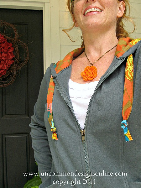 Adorable sweatshirt update with beautiful fabric! Take a plain hoodie up a notch and create this fun and stylish fabric lined hoodie. #sewing #fabric #annamariahorner #hoodie #refashion Adorable sweatshirt update with beautiful fabric! Take a plain hoodie up a notch and create this fun and stylish fabric lined hoodie. #sewing #fabric #annamariahorner #hoodie #refashion